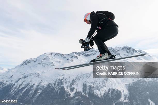 Former Swiss ski racer Bruno Kernen films the slope for TV during a training session of the men's downhill race at the 2017 FIS Alpine World Ski...