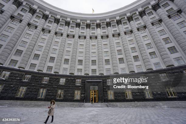 Employees exit the headquarters of the finance ministry in Kiev, Ukraine, on Wednesday, Feb. 2017. Creditors of Ukraines No. 1 lender, whose $555...