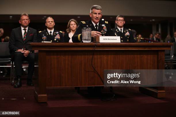 Army Gen. John Nicholson, commander of Resolute Support of United States Forces, testifies during a hearing before Senate Armed Services Committee...