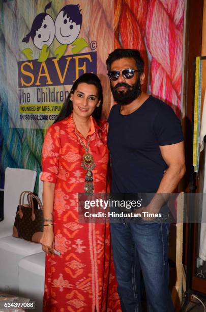 Bollywood actor Suniel Shetty with her wife Mana Shetty during a Charity exhibition Araaish organised by Mana Shetty, wife of actor Suniel Shetty, at...