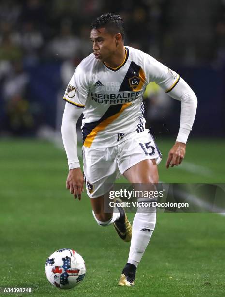 Ariel Lassiter of the Los Angeles Galaxy paces the ball on the attack during the friendly match against Club Tijuana at StubHub Center on February 7,...