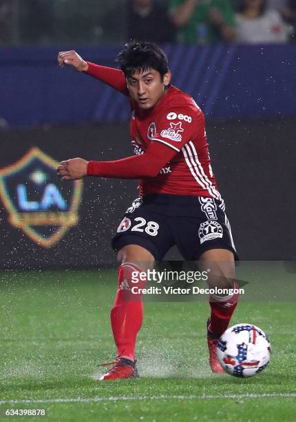 Amando Moreno of Club Tijuana crosses during the friendly match against the Los Angeles Galaxy at StubHub Center on February 7, 2017 in Carson,...
