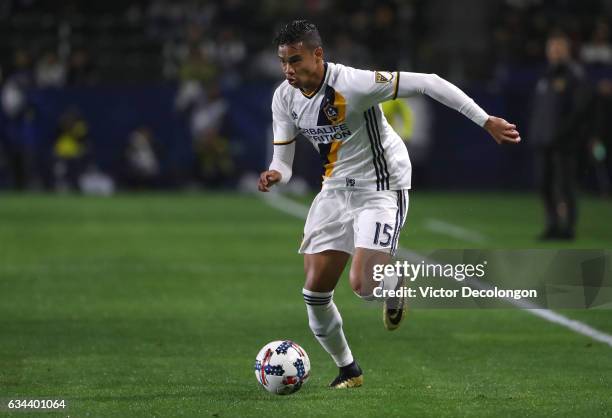 Ariel Lassiter of the Los Angeles Galaxy paces the ball on the attack during the friendly match against Club Tijuana at StubHub Center on February 7,...