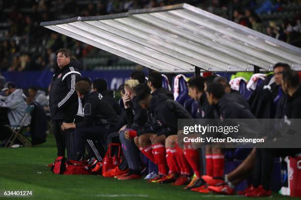 Head Coach Miguel Herrera of Club Tijuana looks on from the bench area during the friendly match against the Los Angeles Galaxy at StubHub Center on...