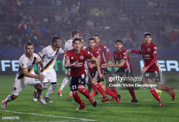 Josh Turnley and Bradley of the Los Angeles Galaxy and Pablo Meza, Henry Martin, Hiram Munoz and Carlos Vargas of Club Tijuana and their teammates...