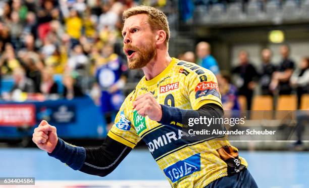 Gudjon Valur Sigurdsson of Rhein Neckar Loewen celebrates a goal during the EHF Men's Champions League Group Phase game between Rhein-Neckar Loewen...