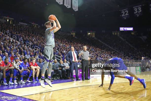 Kansas State Wildcats forward Dean Wade is wide open for the three as Kansas Jayhawks guard Josh Jackson slipped playing defense in the Big 12...