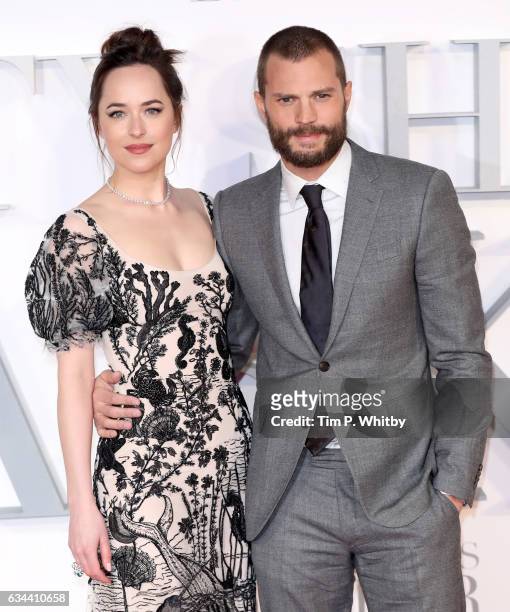Dakota Johnson and Jamie Dornan attend the UK Premiere of "Fifty Shades Darker" at the Odeon Leicester Square on February 9, 2017 in London, United...