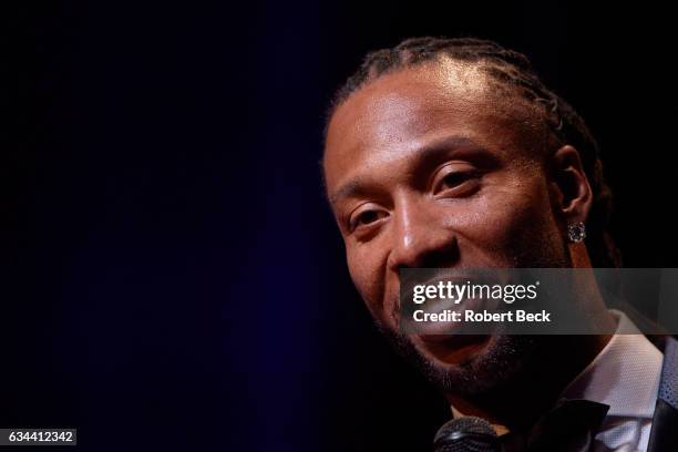 Closeup of Arizona Cardinals wide receiver Larry Fitzgerald on stage during award ceremony at Wortham Theater. Fitzgerald was a co-recipient of the...