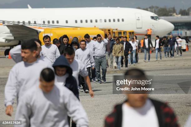 Guatemalan immigrants deported from the United States arrive on a ICE deportation flight on February 9, 2017 in Guatemala City, Guatemala. The...