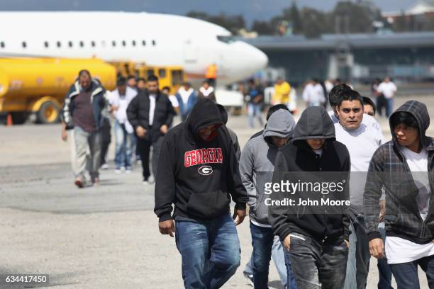 Guatemalan immigrants deported from the United States arrive on a ICE deportation flight on February 9, 2017 in Guatemala City, Guatemala. The...