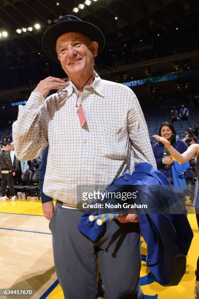 Actor, Bill Murray smiles and walks off the court after the Chicago Bulls game against the Golden State Warriors on February 8, 2017 at ORACLE Arena...