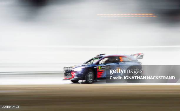 Thierry Neuville of Belgium and his co-driver Nicolas Gilsoul compete in their Hyundai i20 Coupe WRC during the first stage of the Rally Sweden,...