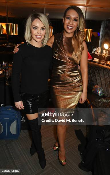 Katie Piper and Rebecca Ferguson pose backstage following Rebecca's performance at Quaglino's on February 9, 2017 in London, Englan