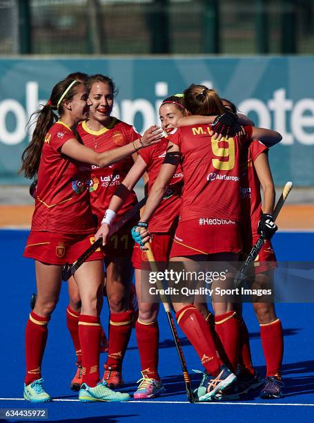 Maria Lopez of Spain celebrates with her teammates after score the fourth goal during the match between Spain and Ghana during day four of the Hockey...