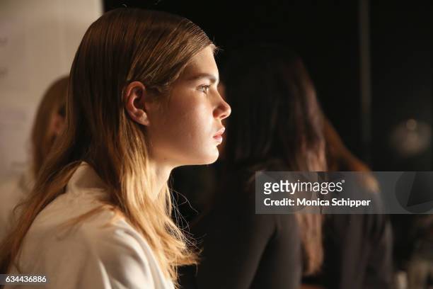 Model prepares backstage at Noon by Noor fashion show during New York Fashion Week: The Shows at Gallery 3, Skylight Clarkson Sq on February 9, 2017...