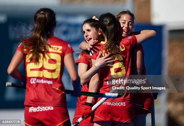 Maria Lopez of Spain celebrates with her teammates after score the second goal during the match between Spain and Ghana during day four of the Hockey...