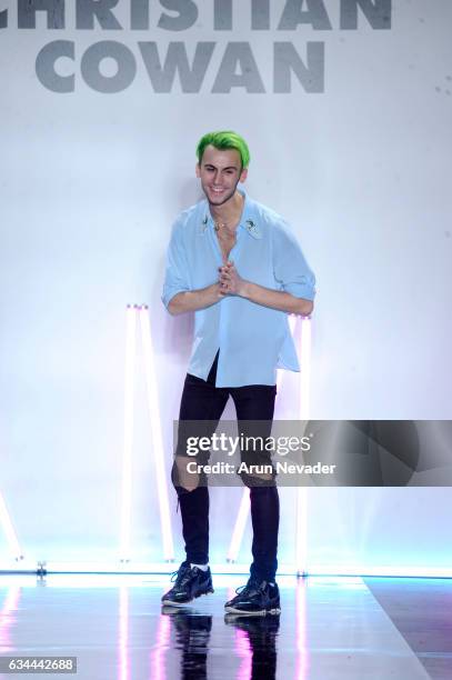 Designer Christian Cowan walks the runway at the Christian Cowan Fall/Winter 2017 Fashion Show at Pier 59 on February 9, 2017 in New York City.