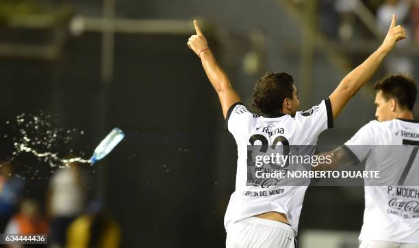 Paraguay's Olimpia player Julian Benitez celebrates after scoring against Ecuador's Independiente del Valle during their Libertadores Cup football...