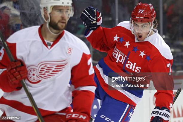 Oshie of the Washington Capitals celebrates his goal in front of Mike Green of the Detroit Red Wings during the second period at Verizon Center on...