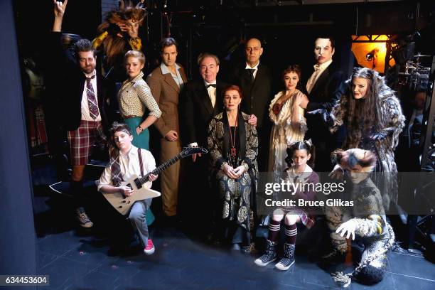 Composer Andrew Lloyd Webber and Glenn Close as "Norma Desmond" pose backstage with the casts representing his musicals playing on broadway currently...