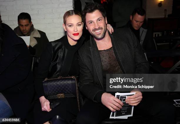 Peta Murgatroyd and Maksim Chmerkovskiy attend the VALENTINNICOLE fashion show during New York Fashion Week at Lovage on February 9, 2017 in New York...