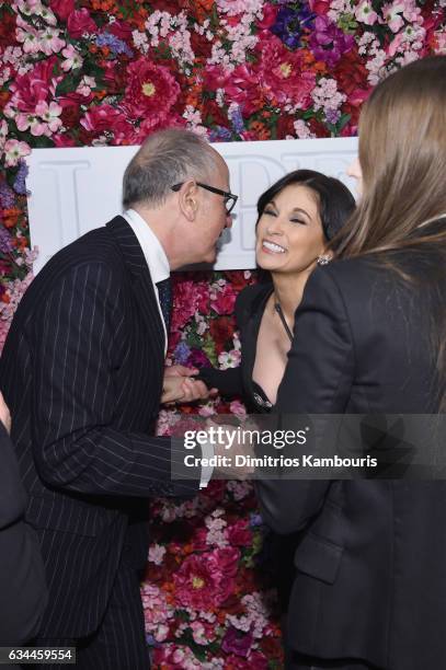 La Perla owner Silvio Scaglia and Creative Director, La Perla Julia Haart greet each other backstage during La Perla Fall/Winter 2017 RTW Show at SIR...