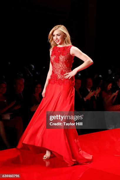 Actress Peyton List walks the runway during the "Go Red for Women" fashion show during Fall 2017 New York Fashion Week at Hammerstein Ballroom on...