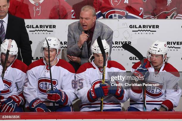 Head coach Michel Therrien of the Montreal Canadiens watches from the bench during the first period of the NHL game against the Arizona Coyotes at...