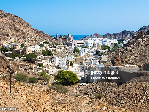 oman, muscat, old town, fort mirani and fort al-mirani - maskat stock-fotos und bilder