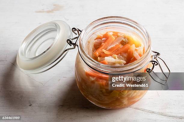 kimchi, fermented korean side dish made of vegetables - kimchee imagens e fotografias de stock