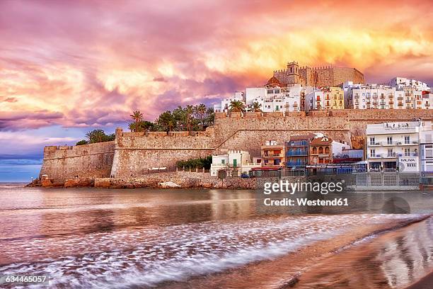 spain, province of castellon, peniscola, costa del azahar, old town with castle, dramatic sky in the evening - castellon province bildbanksfoton och bilder
