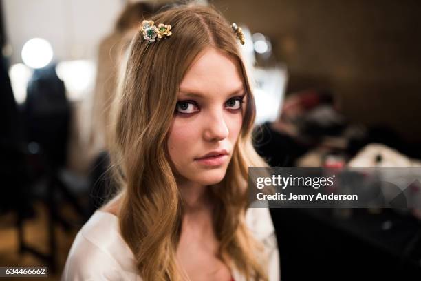 Model prepares backstage during the La Perla show during New York Fashion Week at SIR Stage 37 on February 9, 2017 in New York City.