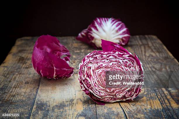 sliced radicchio rosso di chioggia on wood - chicory stock pictures, royalty-free photos & images
