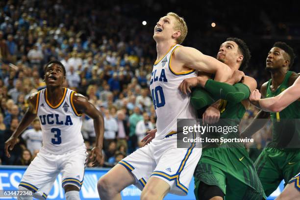 Center Thomas Welsh boxes out Oregon forward Dillon Brooks during an college basketball game between the Oregon Ducks and the UCLA Bruins on February...