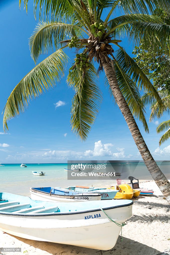 Dominican Republic, boats on the sandy beach of Bayahibe