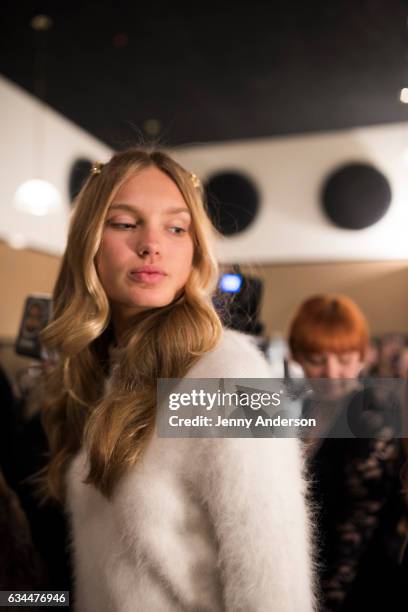 Model prepares backstage during the La Perla show during New York Fashion Week at SIR Stage 37 on February 9, 2017 in New York City.