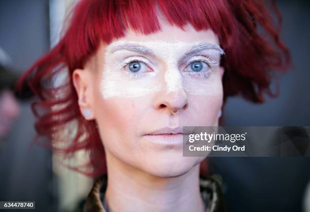 Model prepares backstage at the Berenik Presentation during New York Fashion Week on February 9, 2017 in New York City.