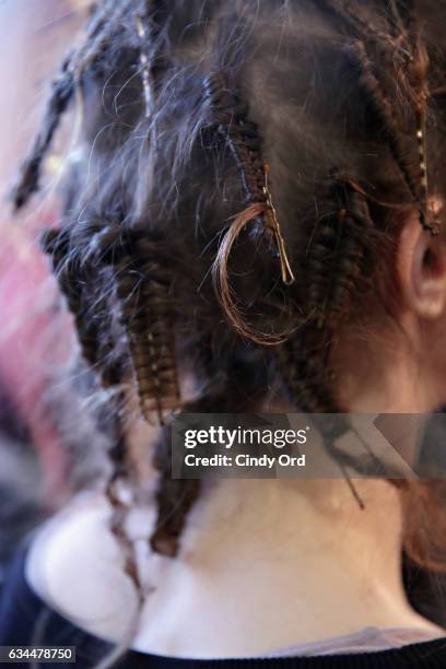 Model prepares backstage at the Berenik Presentation during New York Fashion Week on February 9, 2017 in New York City.