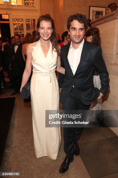 Yvonne Catterfeld and her boyfriend Oliver Wnuk during the Berlin Opening Night by GALA and UFA Fiction at hotel 'The Stue' on February 9, 2017 in...