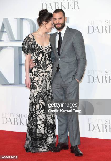 Dakota Johnson and Jamie Dornan attend the UK Premiere of "Fifty Shades Darker" at the Odeon Leicester Square on February 9, 2017 in London, United...