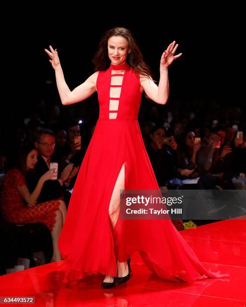 Actress Juliette Lewis walks the runway during the "Go Red for Women" fashion show during Fall 2017 New York Fashion Week at Hammerstein Ballroom on...