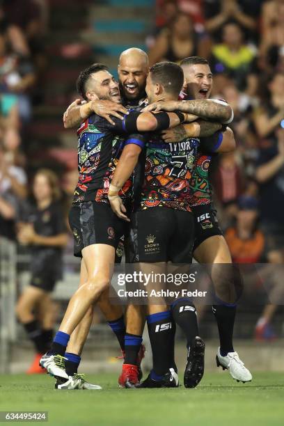 Indigenous All Stars celerbrate a try from Ashley Taylor during the NRL All Stars match between the 2017 Harvey Norman All Stars and the NRL World...