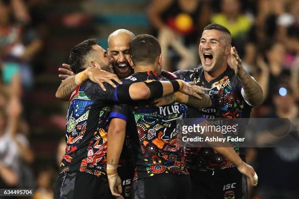 Indigenous All Stars celerbrate a try from Ashley Taylor during the NRL All Stars match between the 2017 Harvey Norman All Stars and the NRL World...