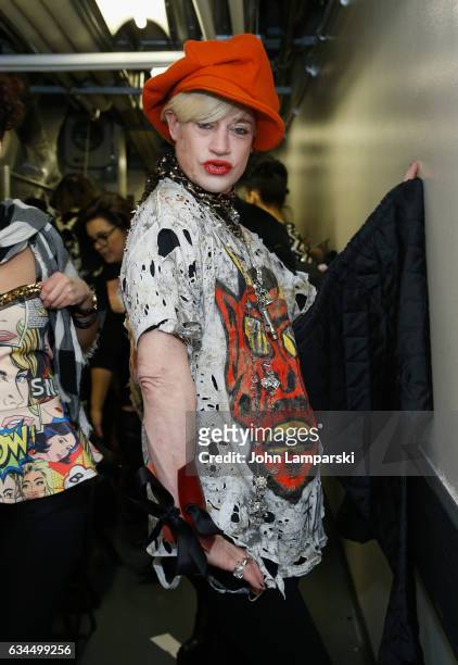 Designer Richie Rich prepares backstage during the Popoganda By Richie Rich during New York Fashion Week at The Theater at Madison Square Garden on...