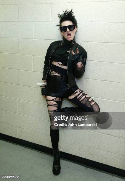 Kiss prepares backstage during the Popoganda By Richie Rich during New York Fashion Week at The Theater at Madison Square Garden on February 9, 2017...