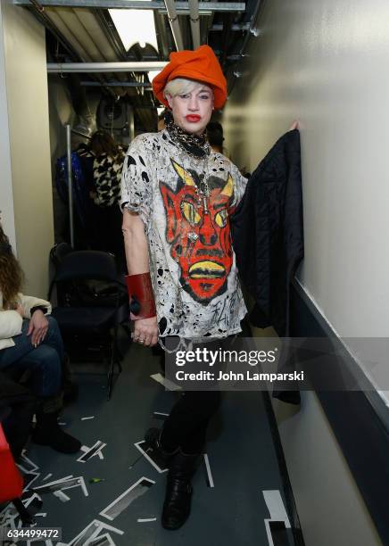 Designer Richie Rich prepares backstage during the Popoganda By Richie Rich during New York Fashion Week at The Theater at Madison Square Garden on...