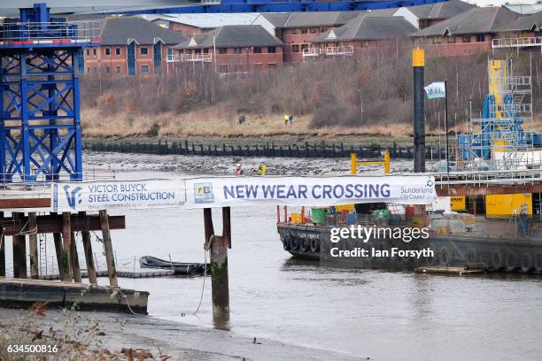 Operations begin as the final 100 metre centrepiece of Sunderland's new River Wear crossing is gradually lifted into position on February 10, 2017 in...