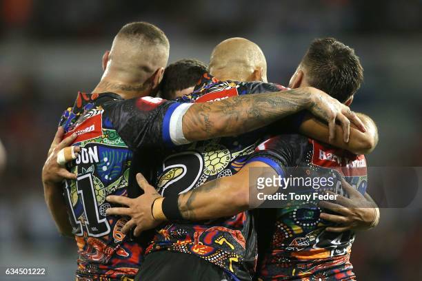 Players from the indigenous All Stars celebrate a try during the NRL All Stars match between the 2017 Harvey Norman All Stars and the NRL World All...