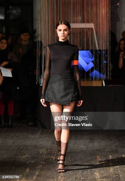 Model walks the runway at Katie Gallagher's fashion show during New York Fashion Week at Projective Space on February 9, 2017 in New York City.